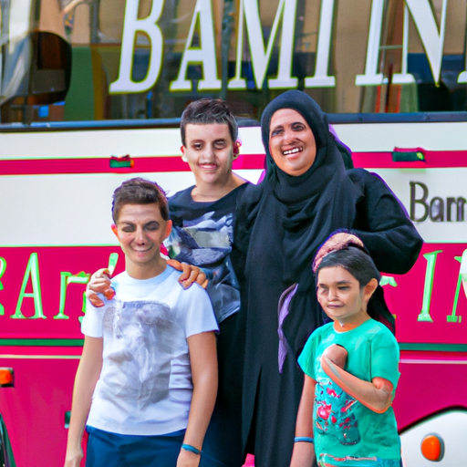 A happy family posing in front of a Bein Harim tour bus